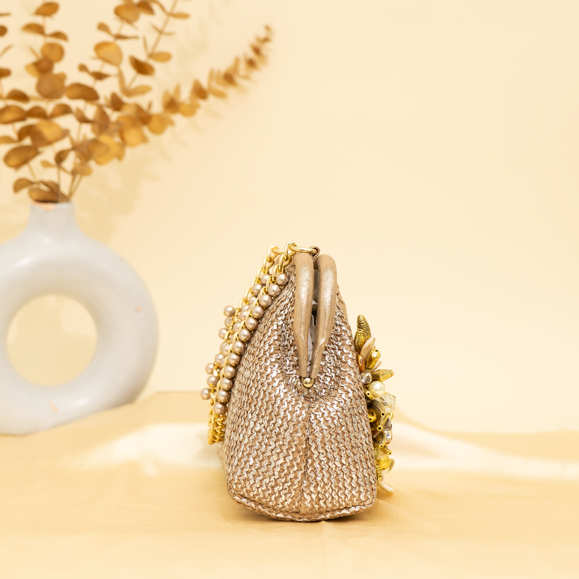 Bronze Empress Shell potli | cara