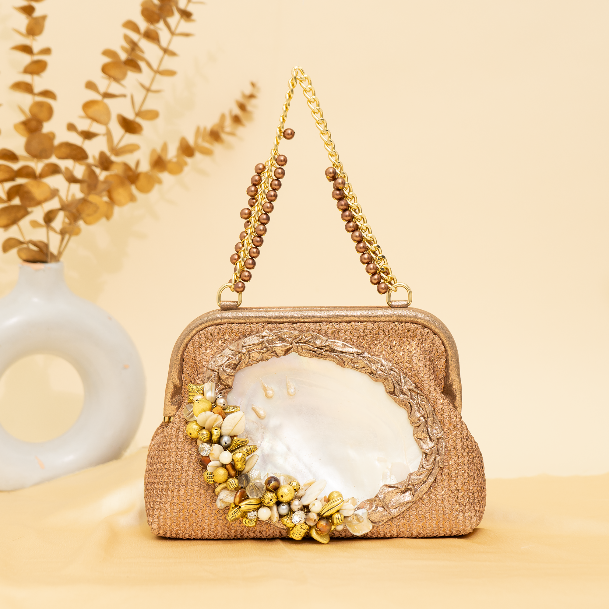 rose gold Empress Shell potli | cara