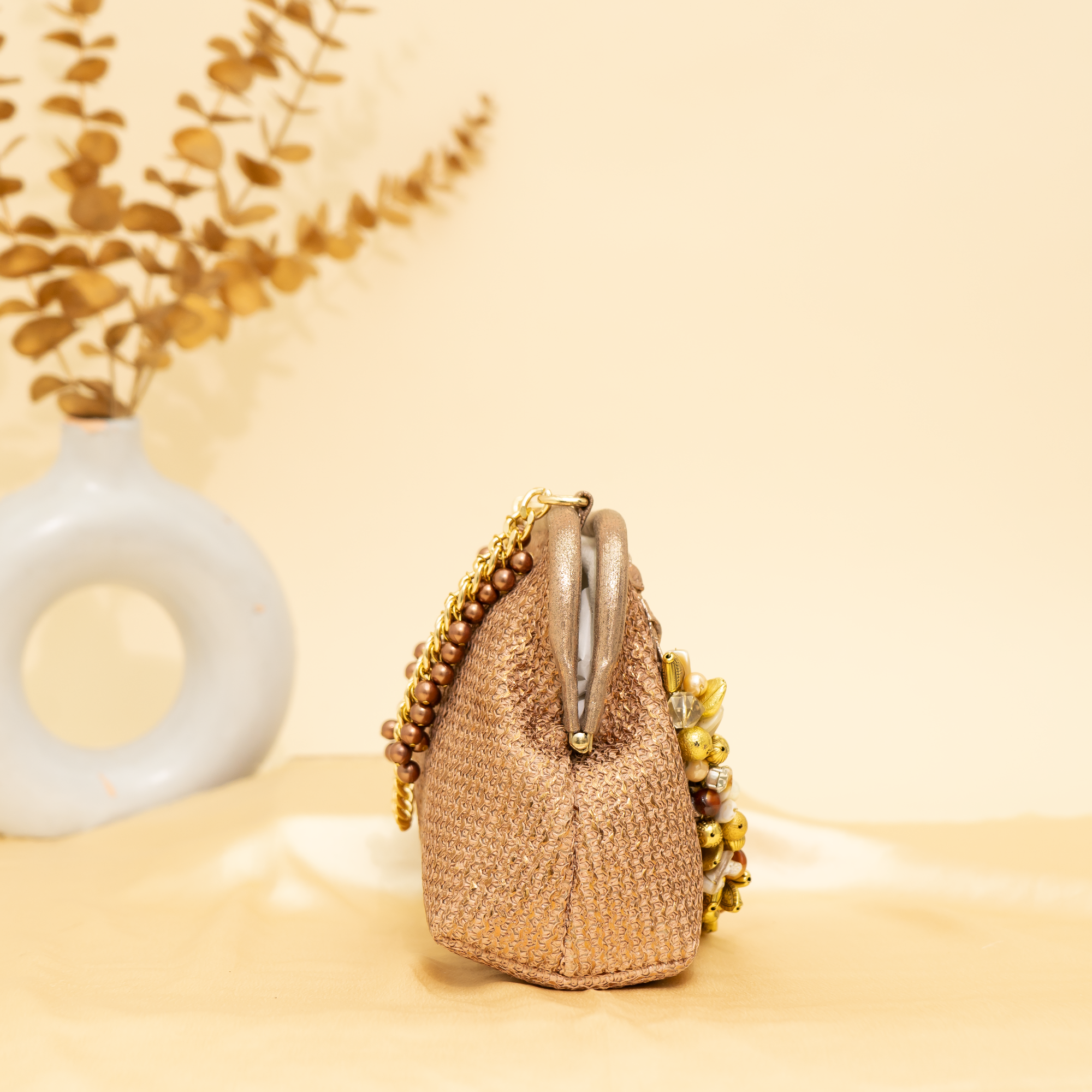 rose gold Empress Shell potli | cara