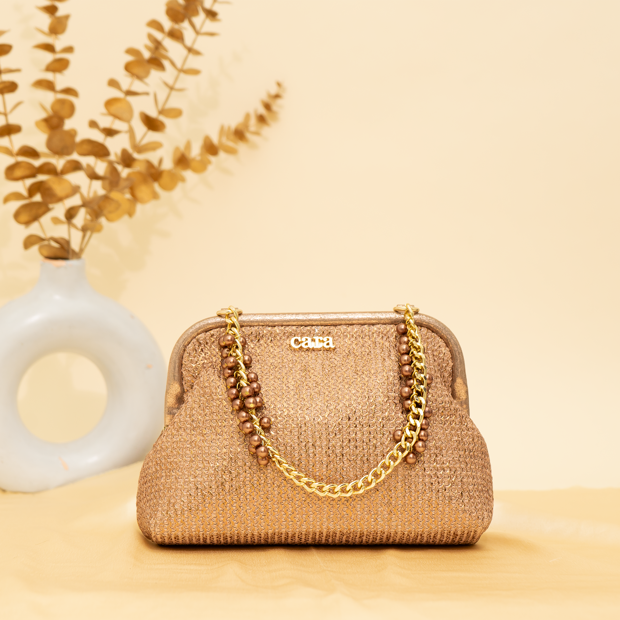 rose gold Empress Shell potli | cara