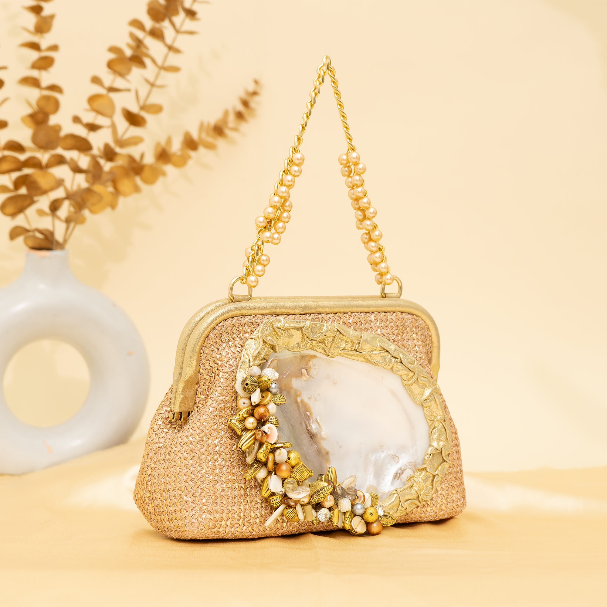 gold Empress Shell potli | cara