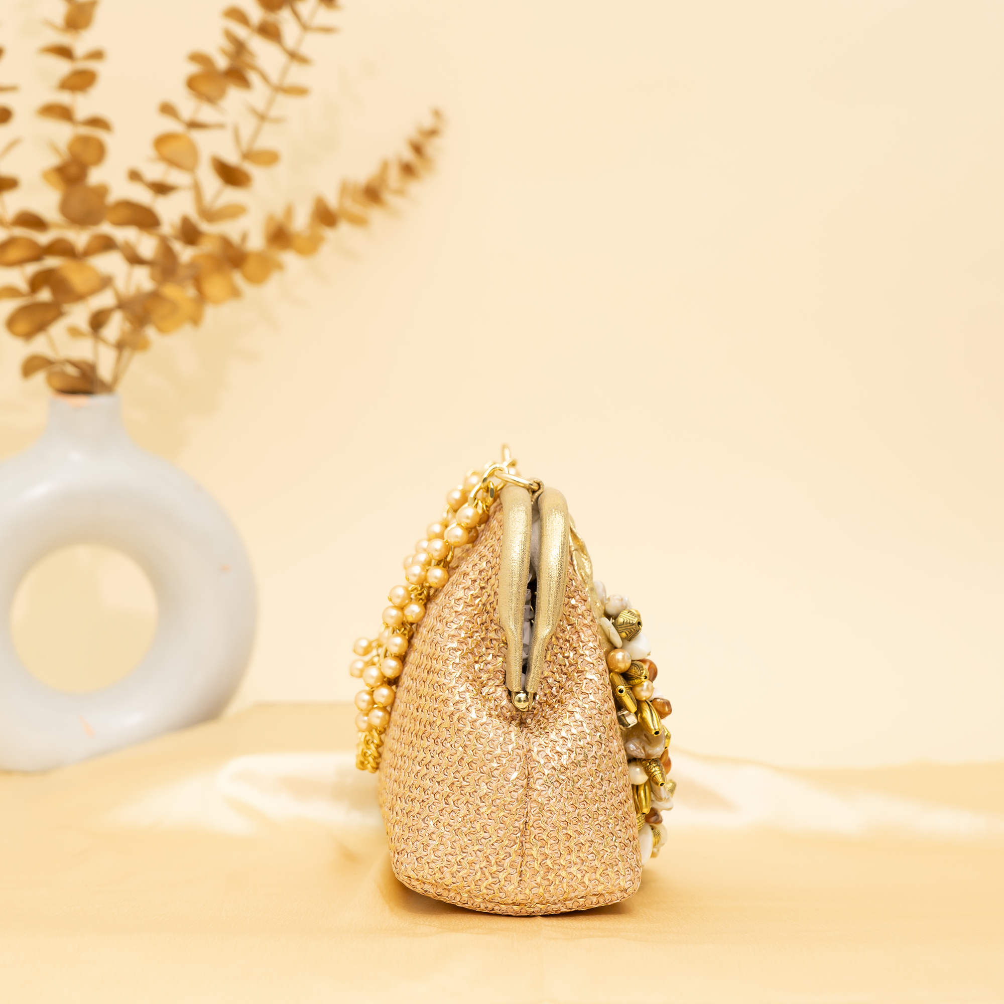 gold Empress Shell potli | cara