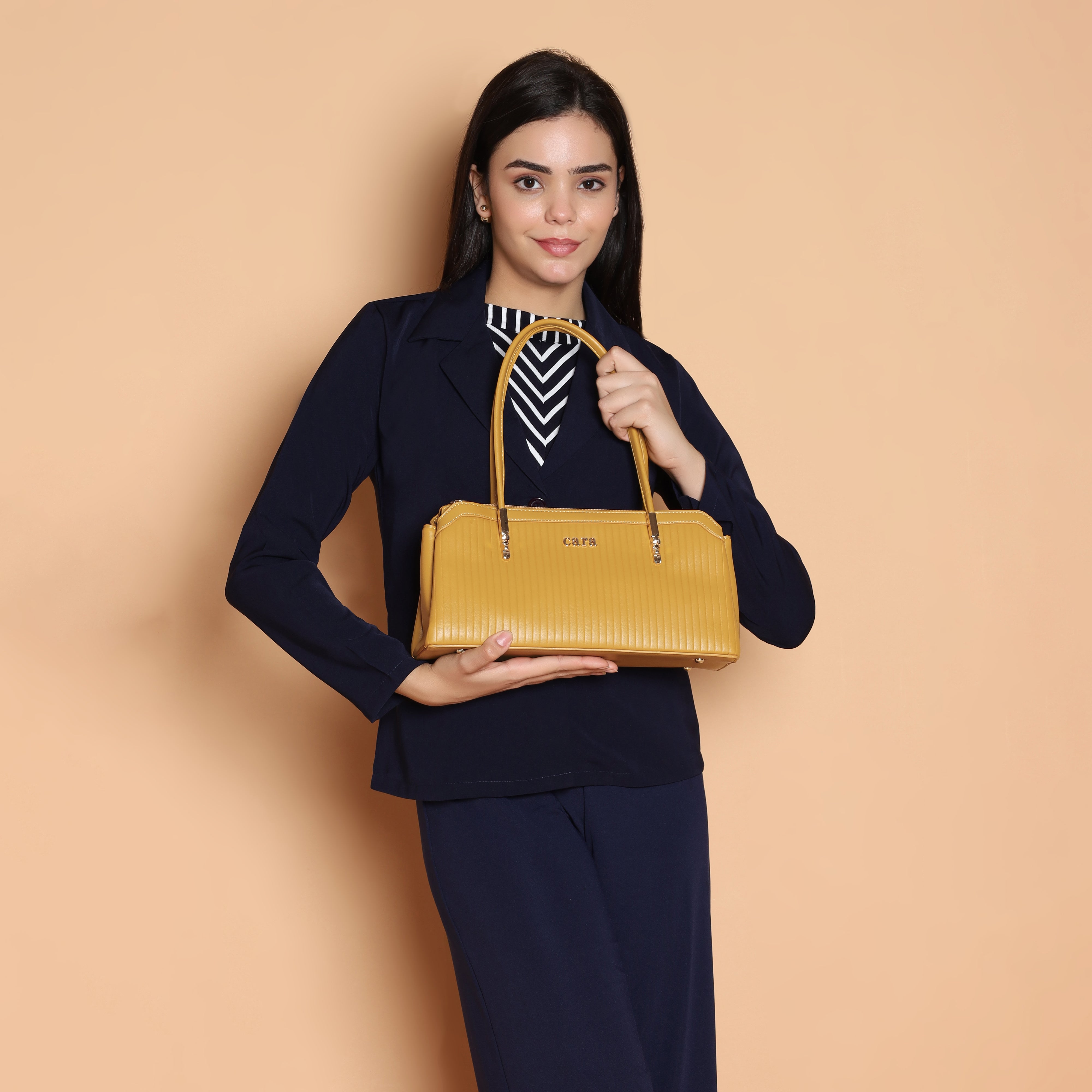 Yellow quilted handbag