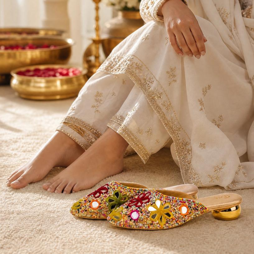 Decorative slippers with floral patterns on a light background