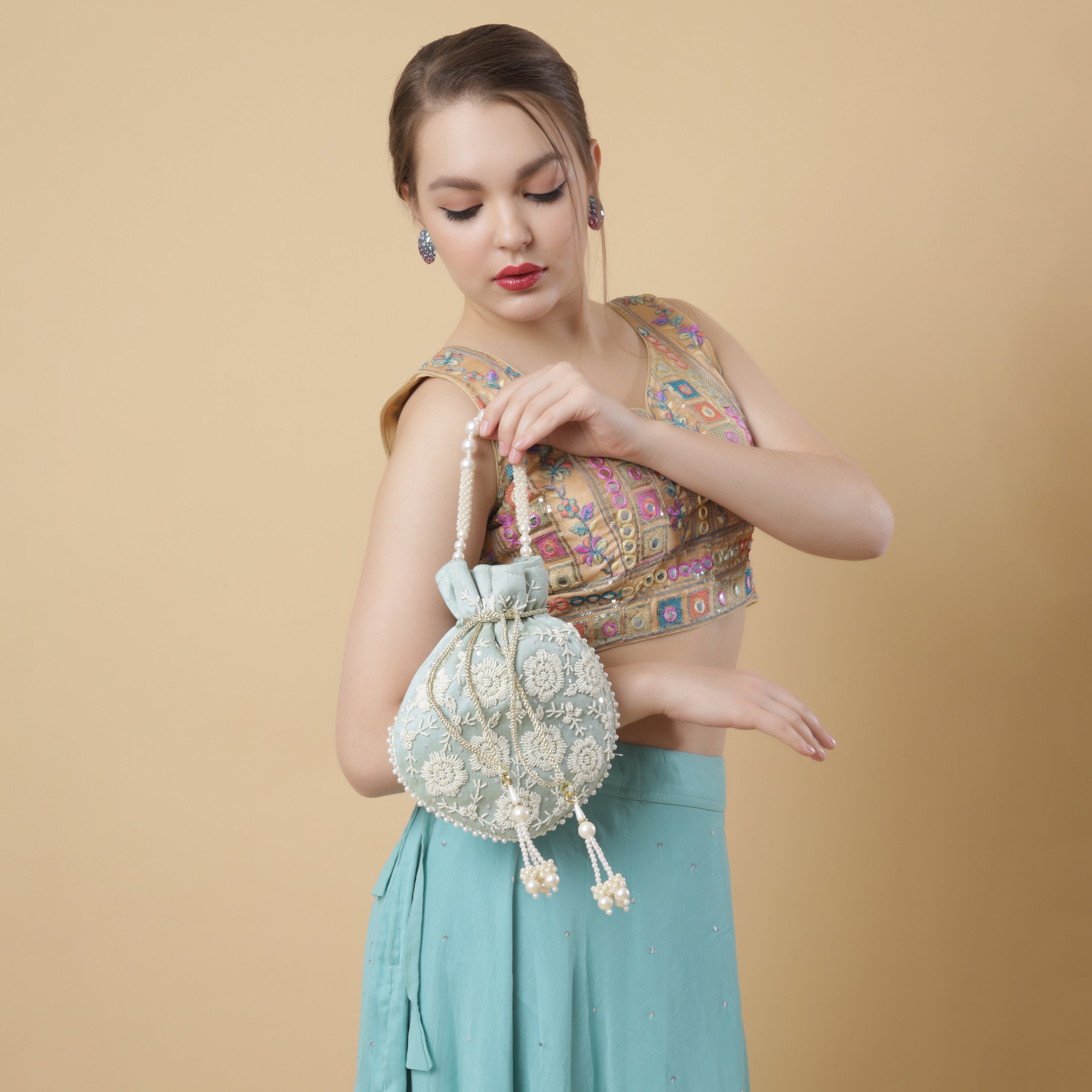 Light Blue Pearl Glow Fantasy Potli