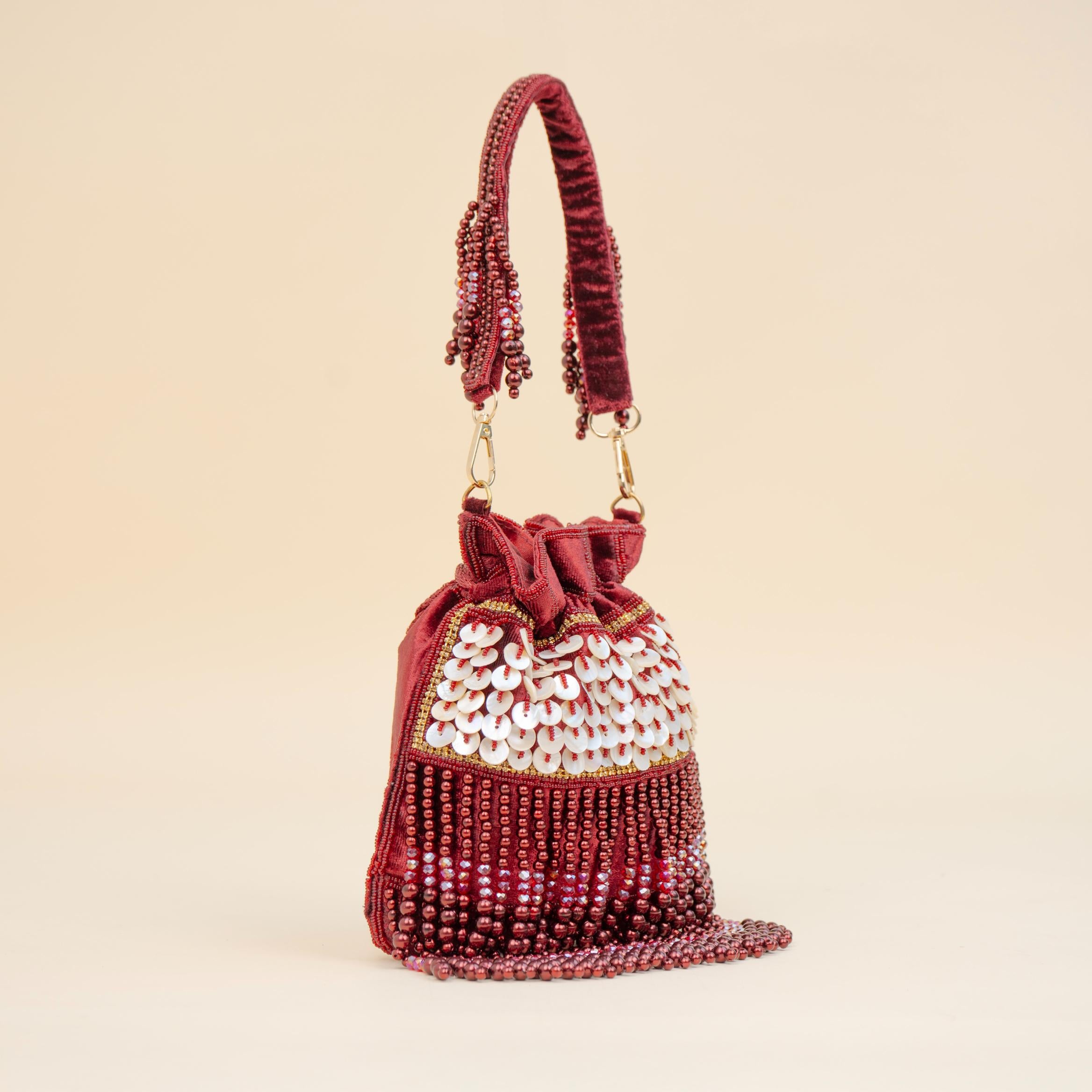 Royal Tassel Sequin Potli