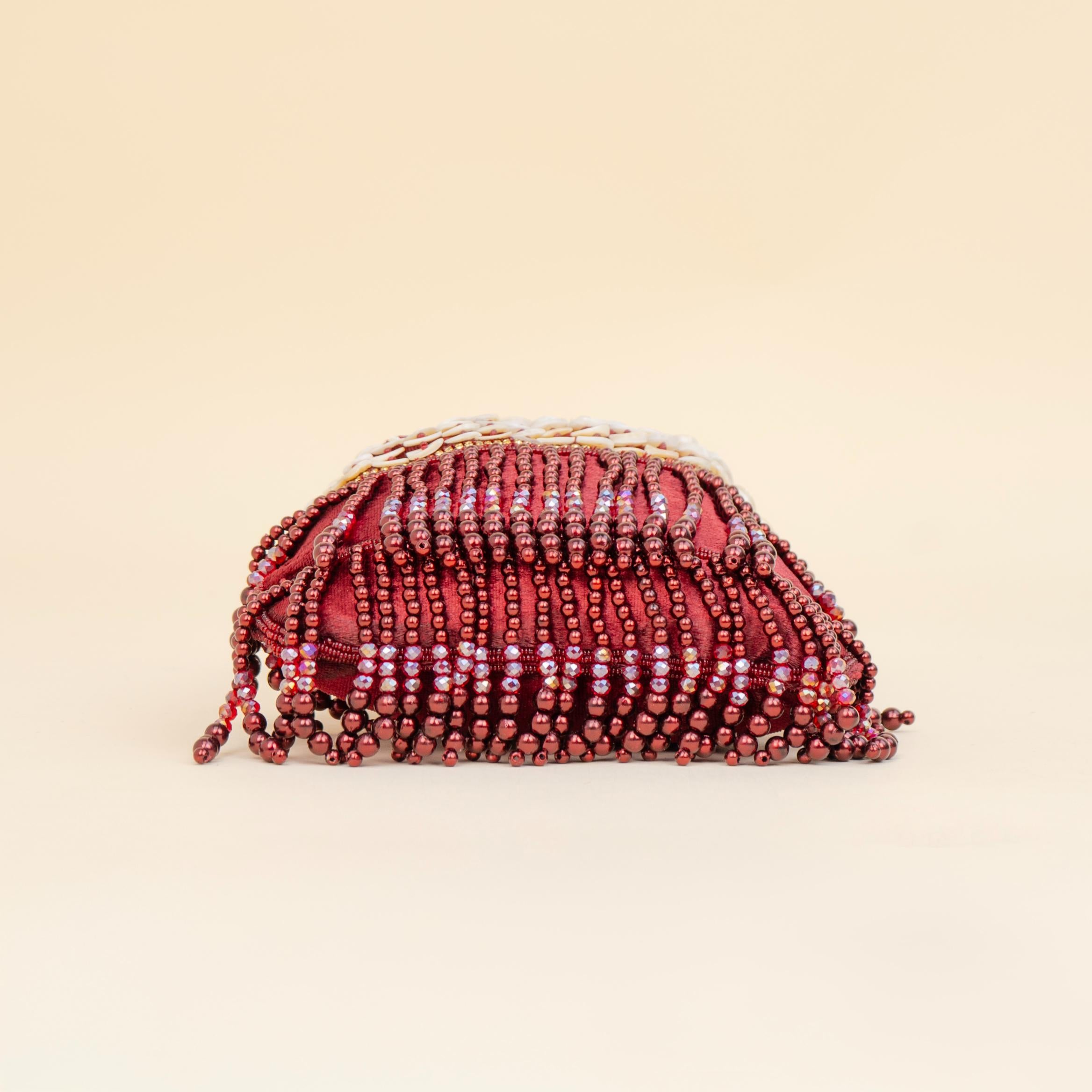 Royal Tassel Sequin Potli