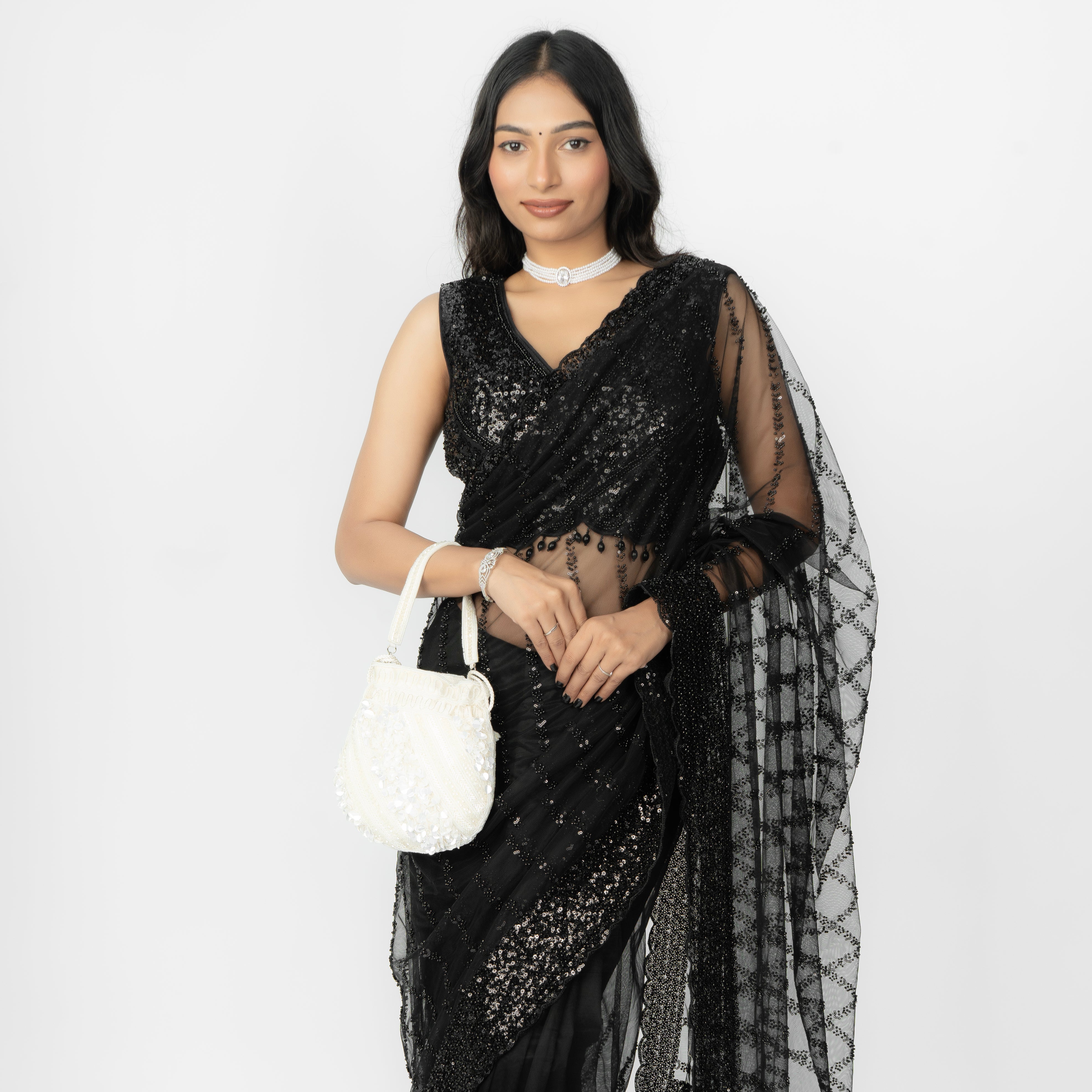 white  Celestial Oyster potli | cara