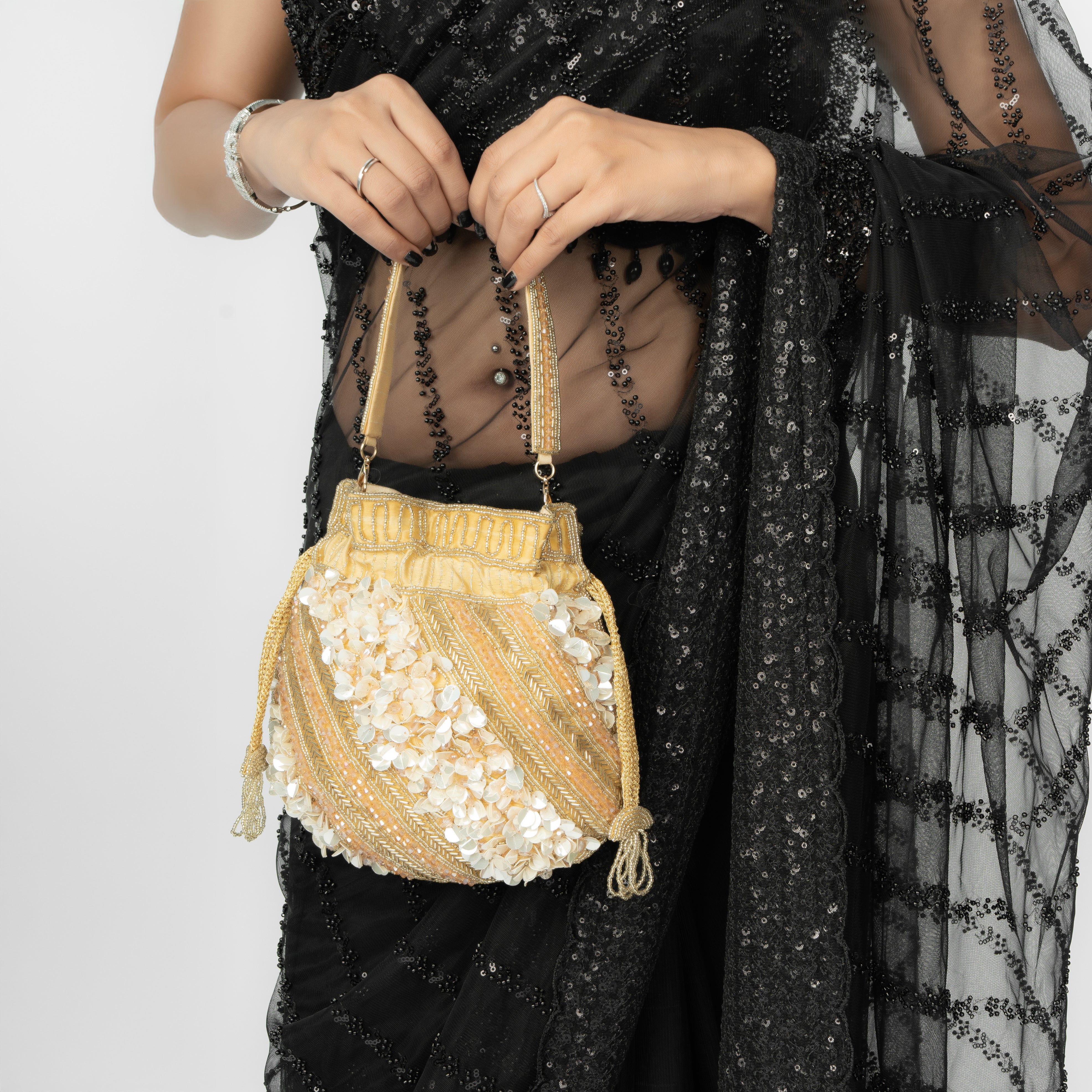 gold Celestial Oyster potli | cara