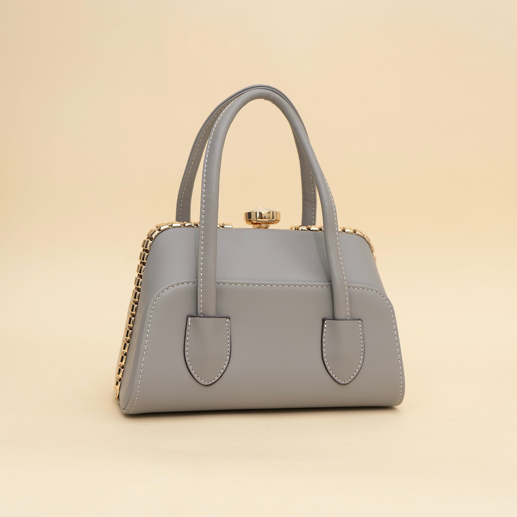 Cara's SophistiHold satchel bag